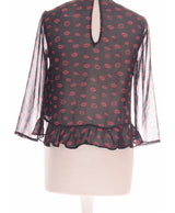 343875 Tops et t-shirts BERSHKA Occasion Vêtement occasion seconde main