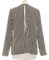 379935 Tops et t-shirts MANGO Occasion Vêtement occasion seconde main