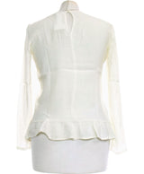 406786 Chemises et blouses MANGO Occasion Vêtement occasion seconde main