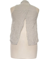 409290 Tops et t-shirts BERSHKA Occasion Vêtement occasion seconde main