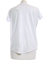 409809 Tops et t-shirts GUESS Occasion Vêtement occasion seconde main