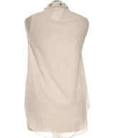423278 Tops et t-shirts MANGO Occasion Vêtement occasion seconde main
