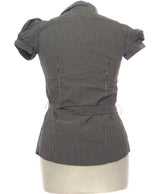 437688 Chemises et blouses NAF NAF Occasion Vêtement occasion seconde main