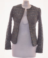 La garantie Once Again : 456222 vêtements d'occasion de marque en état irréprochable.