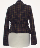La garantie Once Again : 456621 vêtements d'occasion de marque en état irréprochable.