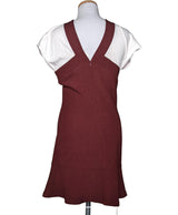 La garantie Once Again : 456847 vêtements d'occasion de marque en état irréprochable.