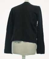 La garantie Once Again : 466222 vêtements d'occasion de marque en état irréprochable.