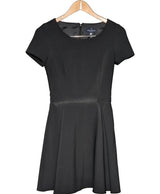 La garantie Once Again : 478856 vêtements d'occasion de marque en état irréprochable.