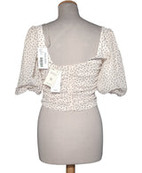 523442 Tops et t-shirts MANGO Occasion Vêtement occasion seconde main
