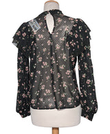 530715 Chemises et blouses MANGO Occasion Vêtement occasion seconde main