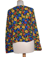 535716 Tops et t-shirts MANGO Occasion Vêtement occasion seconde main
