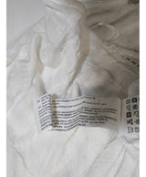 La garantie Once Again : 540597 vêtements d'occasion de marque en état irréprochable.