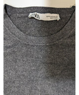La garantie Once Again : 540616 vêtements d'occasion de marque en état irréprochable.