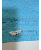 La garantie Once Again : 540640 vêtements d'occasion de marque en état irréprochable.