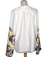541945 Tops et t-shirts MANGO Occasion Vêtement occasion seconde main