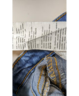 La garantie Once Again : 542549 vêtements d'occasion de marque en état irréprochable.
