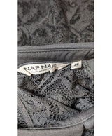 La garantie Once Again : 544566 vêtements d'occasion de marque en état irréprochable.