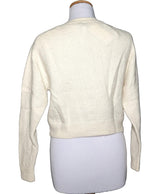La garantie Once Again : 546553 vêtements d'occasion de marque en état irréprochable.