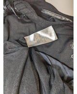La garantie Once Again : 547848 vêtements d'occasion de marque en état irréprochable.