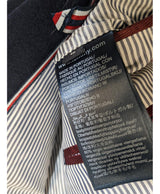 La garantie Once Again : 547986 vêtements d'occasion de marque en état irréprochable.