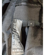 La garantie Once Again : 547987 vêtements d'occasion de marque en état irréprochable.