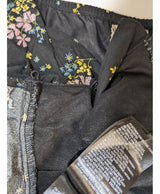 La garantie Once Again : 547992 vêtements d'occasion de marque en état irréprochable.