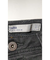 La garantie Once Again : 548555 vêtements d'occasion de marque en état irréprochable.
