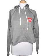 La garantie Once Again : 548615 vêtements d'occasion de marque en état irréprochable.