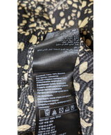 La garantie Once Again : 548629 vêtements d'occasion de marque en état irréprochable.