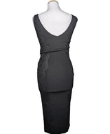 La garantie Once Again : 548670 vêtements d'occasion de marque en état irréprochable.