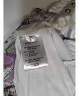 La garantie Once Again : 549994 vêtements d'occasion de marque en état irréprochable.