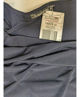 La garantie Once Again : 549995 vêtements d'occasion de marque en état irréprochable.
