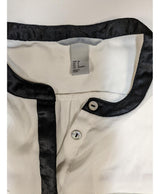 La garantie Once Again : 550515 vêtements d'occasion de marque en état irréprochable.