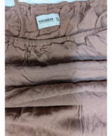 La garantie Once Again : 550530 vêtements d'occasion de marque en état irréprochable.