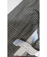 La garantie Once Again : 550659 vêtements d'occasion de marque en état irréprochable.