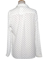 La garantie Once Again : 552613 vêtements d'occasion de marque en état irréprochable.