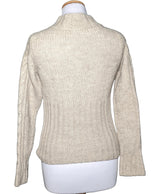 La garantie Once Again : 554526 vêtements d'occasion de marque en état irréprochable.