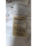 La garantie Once Again : 554538 vêtements d'occasion de marque en état irréprochable.