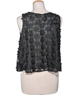554884 Tops et t-shirts MANGO Occasion Vêtement occasion seconde main