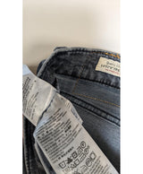 La garantie Once Again : 556581 vêtements d'occasion de marque en état irréprochable.