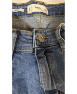 La garantie Once Again : 556617 vêtements d'occasion de marque en état irréprochable.