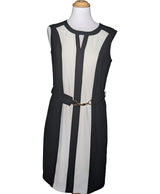 La garantie Once Again : 556658 vêtements d'occasion de marque en état irréprochable.