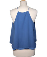 556924 Tops et t-shirts MANGO Occasion Vêtement occasion seconde main