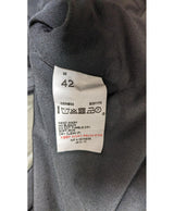 La garantie Once Again : 558280 vêtements d'occasion de marque en état irréprochable.