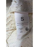 La garantie Once Again : 558428 vêtements d'occasion de marque en état irréprochable.