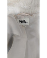 La garantie Once Again : 558544 vêtements d'occasion de marque en état irréprochable.