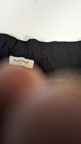 La garantie Once Again : 558580 vêtements d'occasion de marque en état irréprochable.