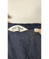 La garantie Once Again : 560144 vêtements d'occasion de marque en état irréprochable.