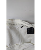 La garantie Once Again : 560150 vêtements d'occasion de marque en état irréprochable.