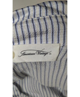 La garantie Once Again : 560200 vêtements d'occasion de marque en état irréprochable.